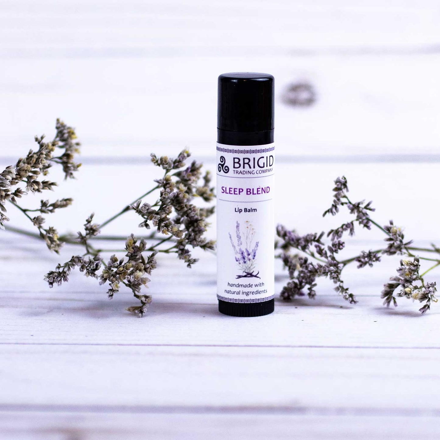 Lavender-scent lip balm tube with black cap, BRIGID label