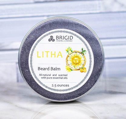 Beard balm tin close-up with LITHA Beard Balm label, silver-gray rim
