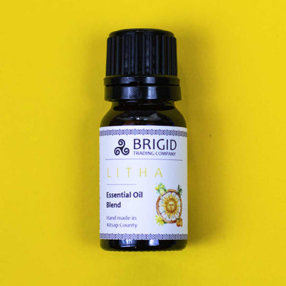 Litha essential oil diffuser bottle with dark cap, BRIGID label