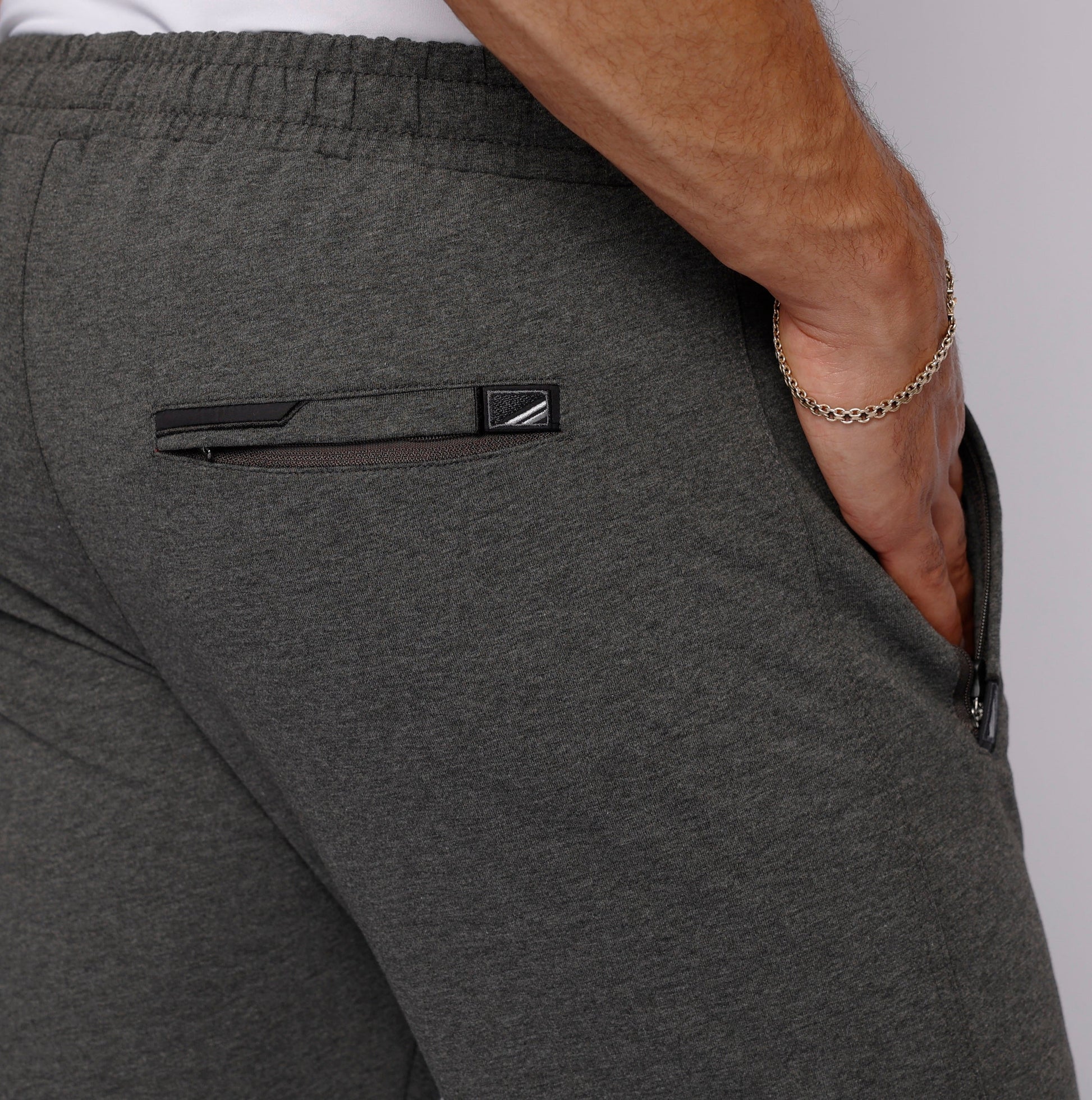 Men's athletic sweatpants, dark heather grey, back hip zip pocket and logo detail