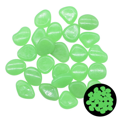 Green glow-in-the-dark pebbles pile with green glow badge inset
