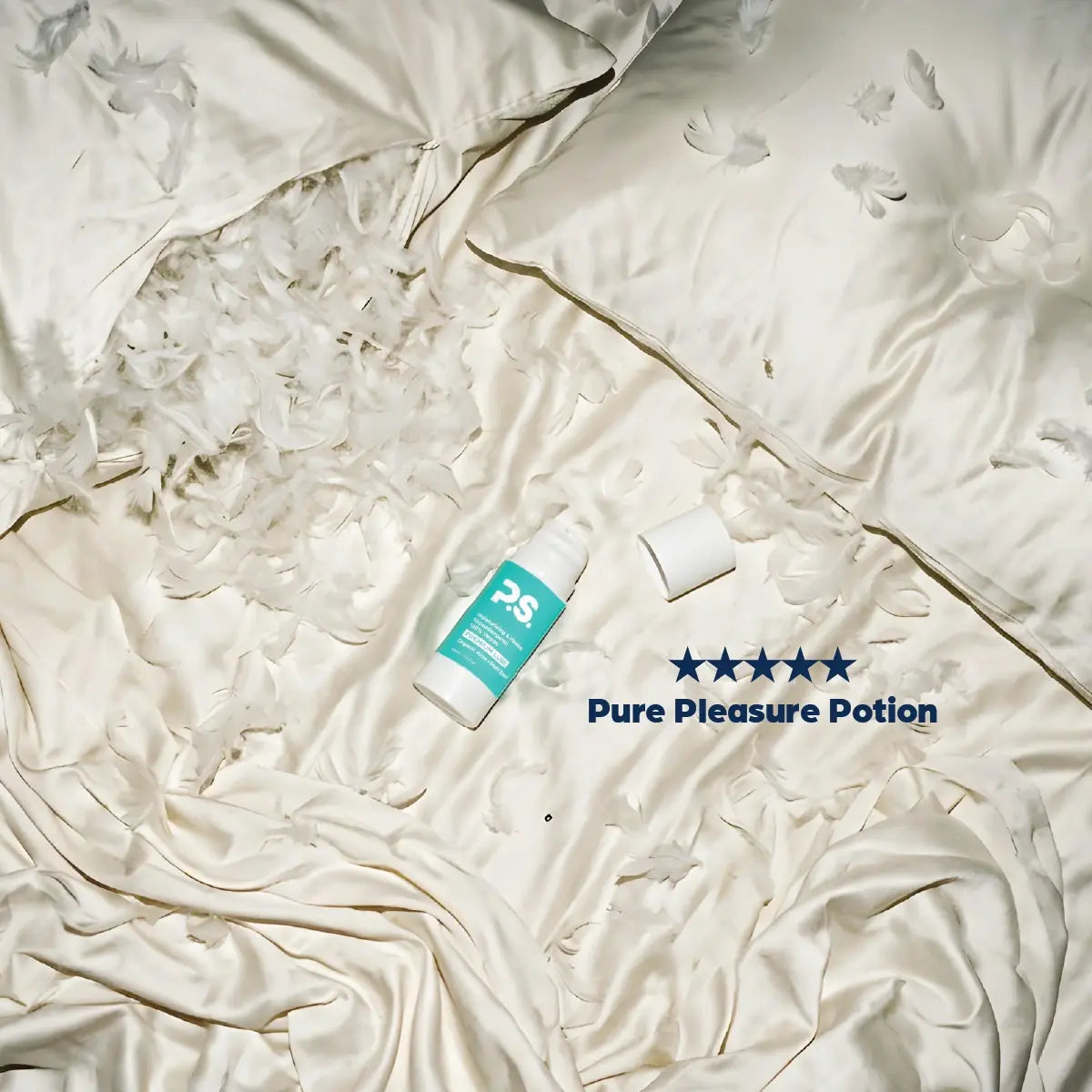Teal-and-white personal lubricant bottle and cap on crinkled white wrap