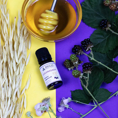 Diffuser fragrance oil bottle with black cap and label reading LUGHNASADH