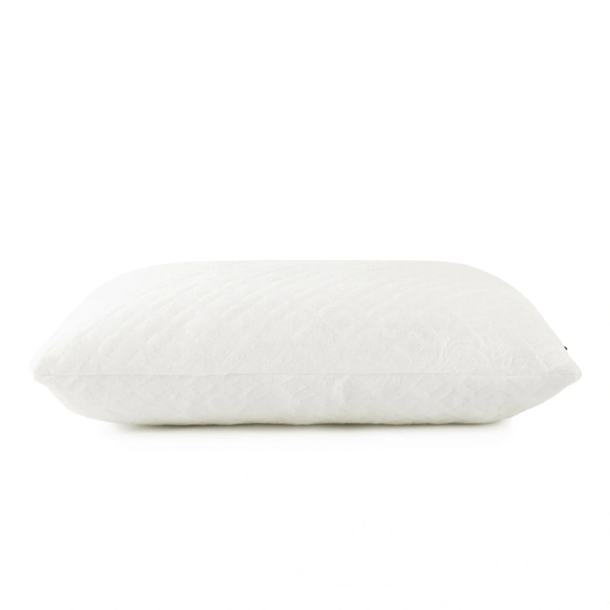 Bamboo cooling lumbar pillow, white contoured shape with low profile.