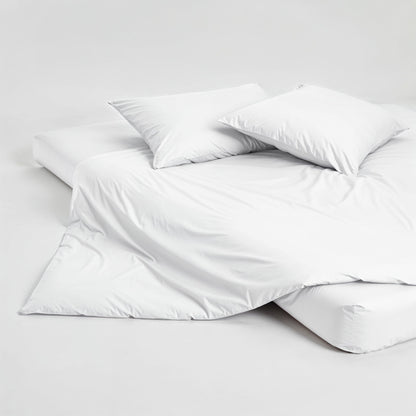 White sateen pillowcase set with two folded pillows and smooth finish