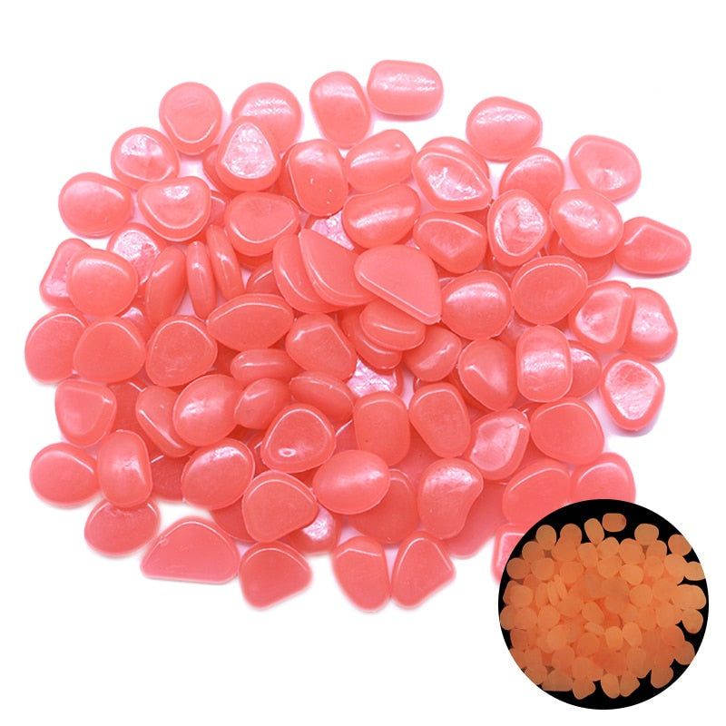 Glow-in-the-dark garden pebbles, rose-pink translucent smooth stones
