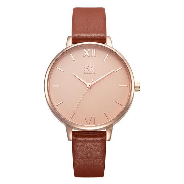 Shengke women's fashion watch with brown leather strap, rose-gold case, peach dial