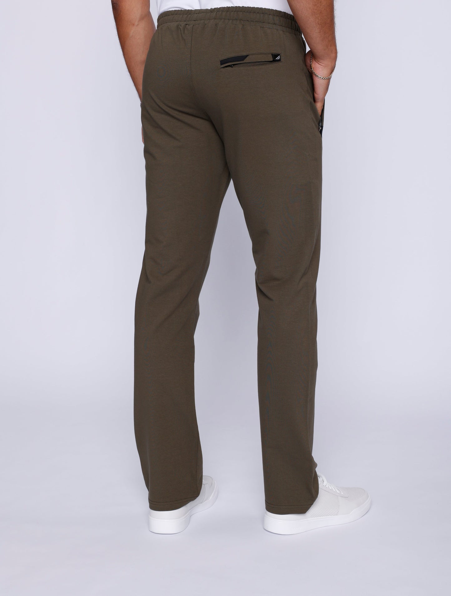 Khaki green straight athletic sweatpants with elastic waistband and side logo patch