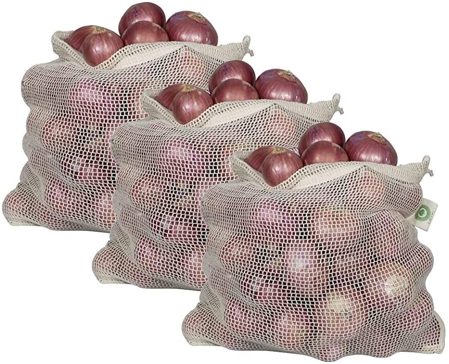 Mesh onion storage bags with drawstring, filled with red onions