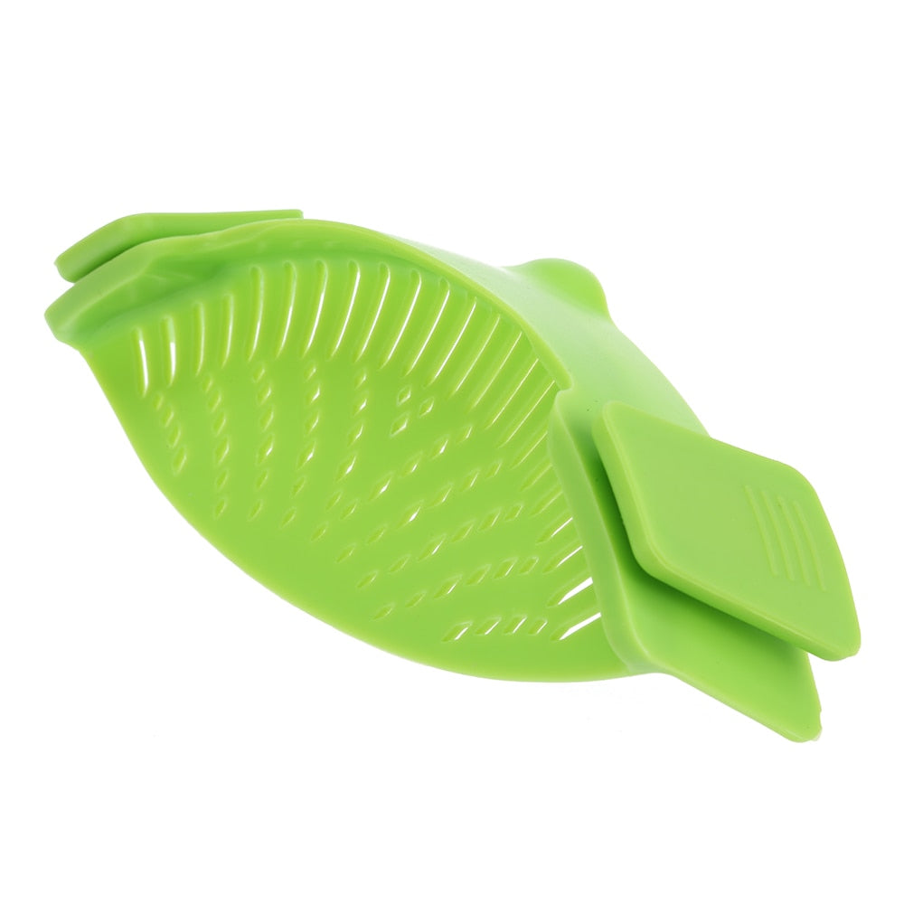 Green silicone snap strainer basket with curved ridged sides
