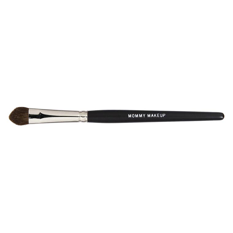 Double shader brush with brown bristles and black handle