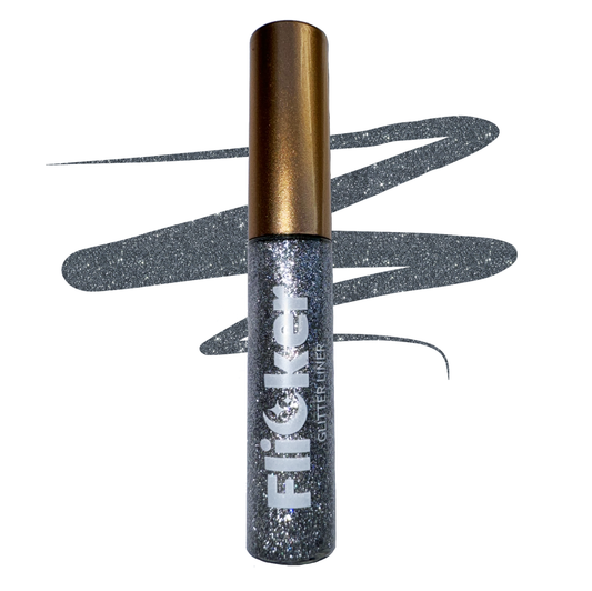 Glitter eyeliner in a metallic tube with gold cap and dark glitter wand applicator