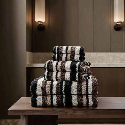 Black and cream striped cotton towels, stacked folded bundle
