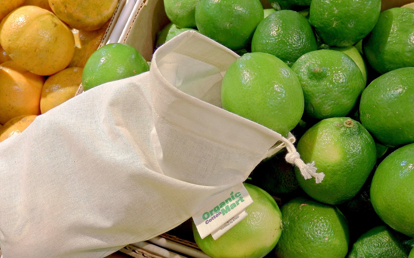 Muslin produce bag filled with green grapes