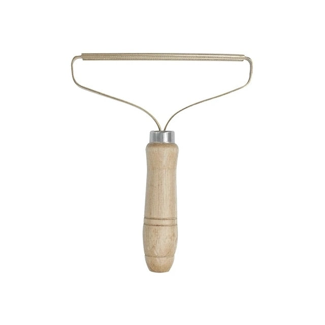 Lint remover brush with wooden handle and U-shaped bristle frame