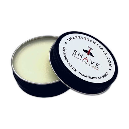 Beard balm tin with lid and pale balm inside, dark blue rim