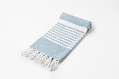 Turkish beach towel, blue with white stripes and tassel fringe