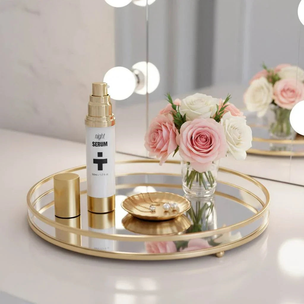 Night serum bottle on gold tray with floral bouquet