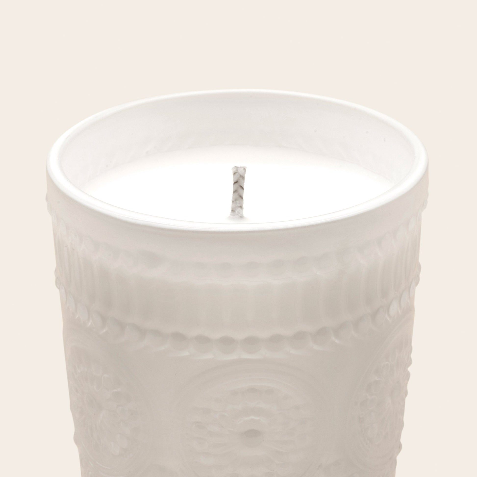 White textured glass scented candle with unlit wick