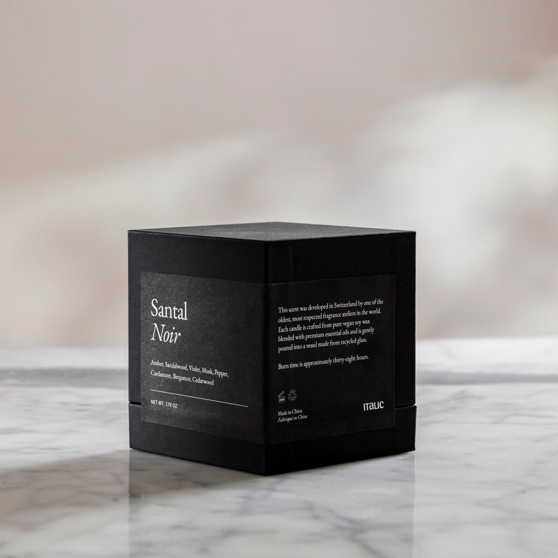 Black gift box with Santal Noir text and side panel details, no candle shown