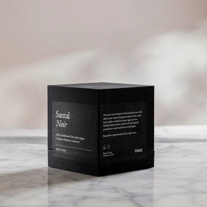 Black gift box with Santal Noir text and side panel details, no candle shown