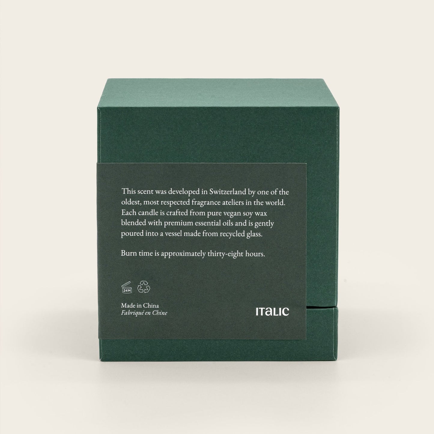 Green candle gift box with "Made in China" and italic logo