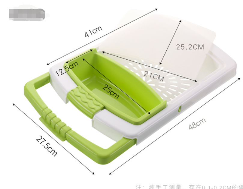 Green and white plastic chopping board with ridged drain insert and tray
