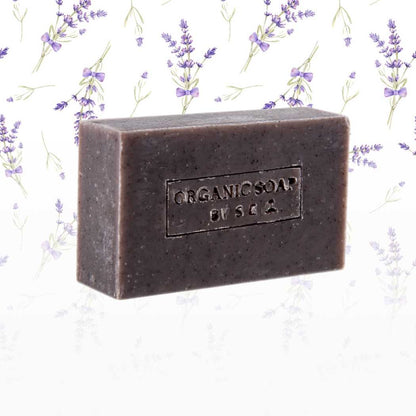 Organic bar soap, dark brown bar with embossed label and textured finish.