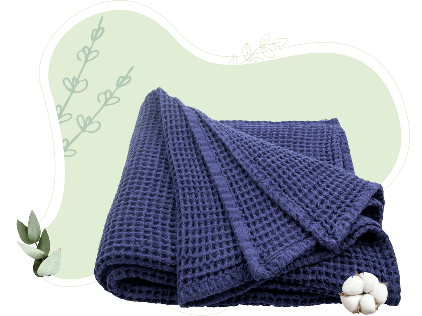 Deep blue waffle weave throw blanket folded with visible waffle pattern.