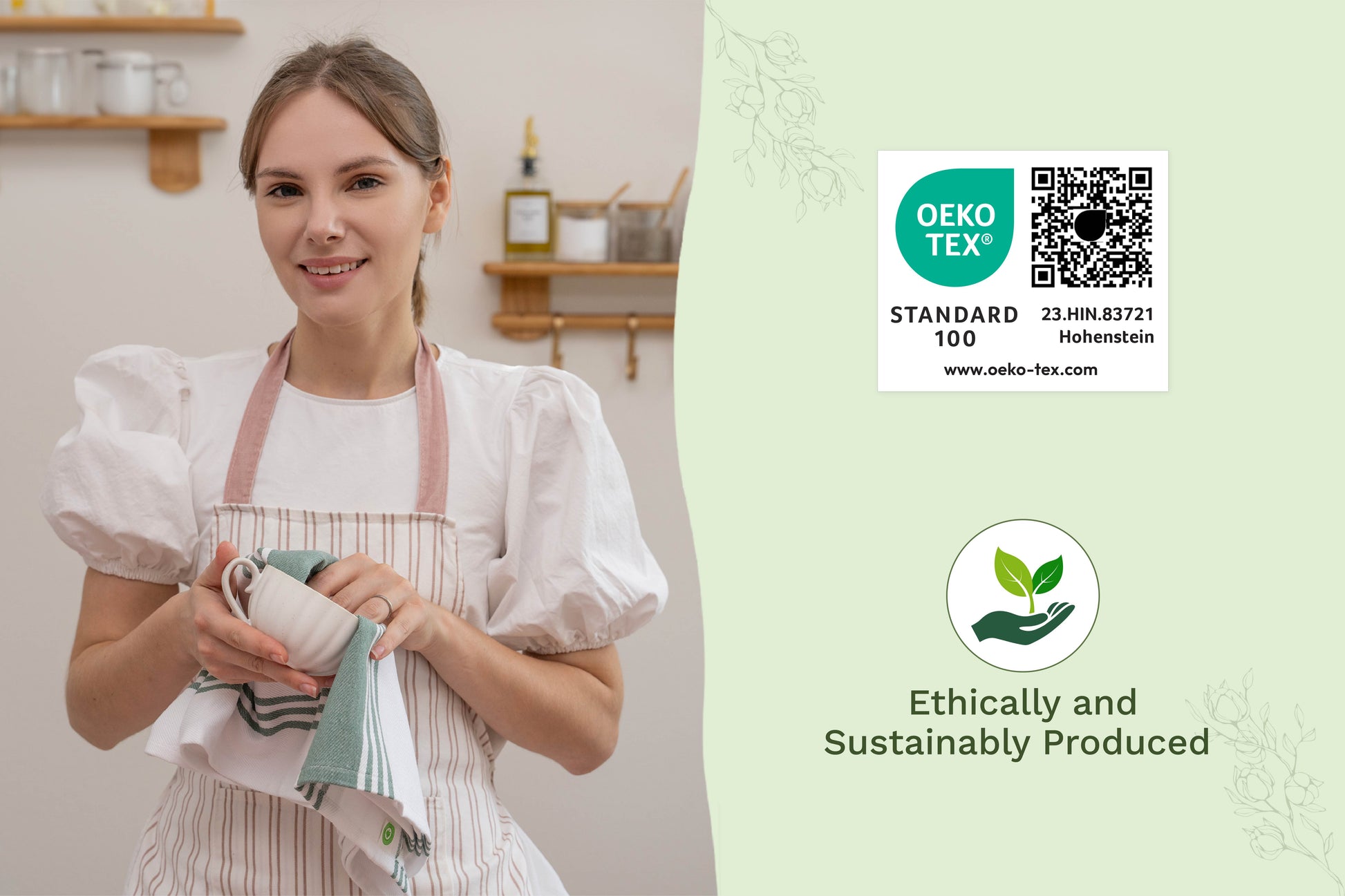 White kitchen towel with green stripes held by a woman wearing a white apron