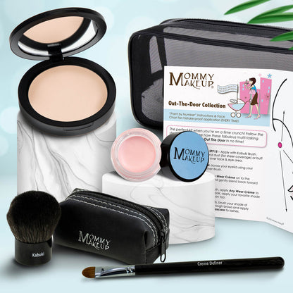 Travel makeup set with beige compact, rosy-pink cream, brush, and black zip pouch