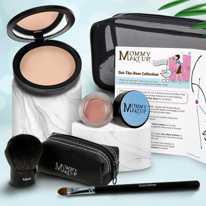 Travel makeup set with beige compact, light beige cream, brush, and black zip pouch