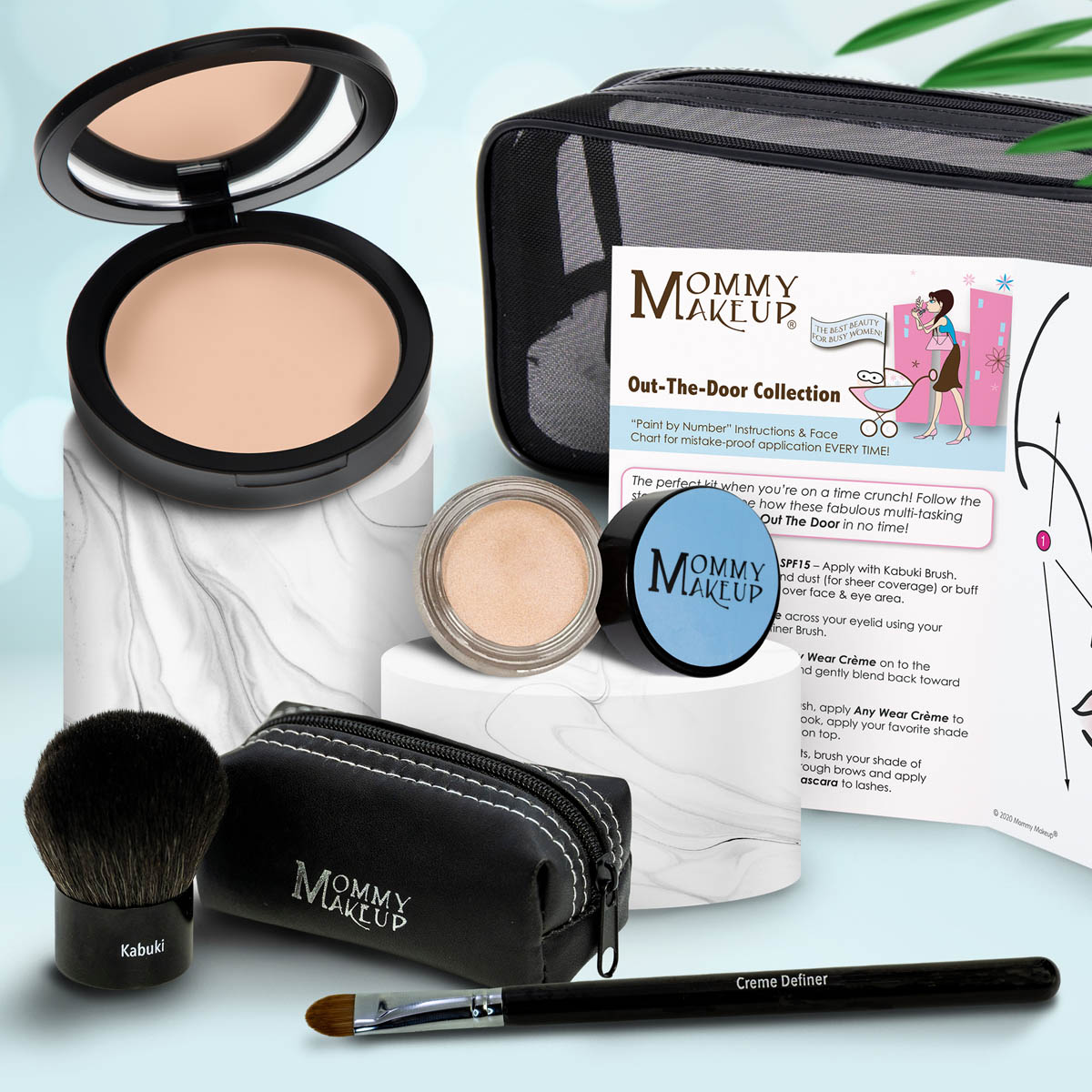 Makeup set with beige compact, light beige jar, makeup brush, black zip pouch, and applicator.