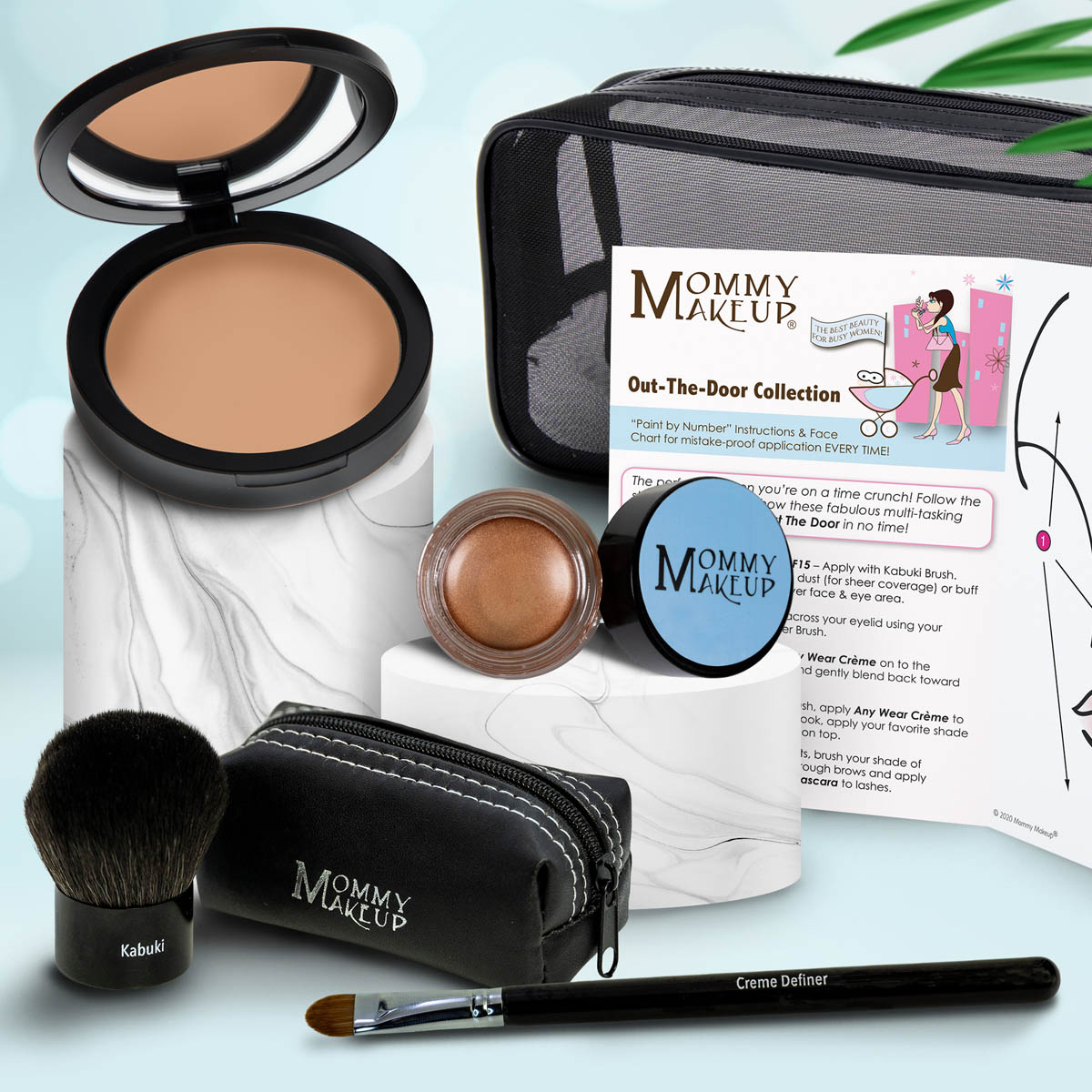 Travel makeup set with medium tan compact, warm bronze powder, brush, and zip case with pencil applicator