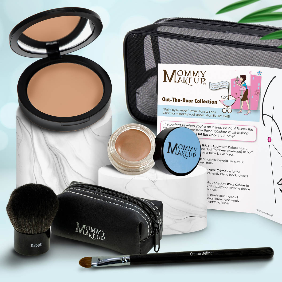 Travel makeup set with medium tan compact, nude beige powder, brush, and zip case with pencil applicator