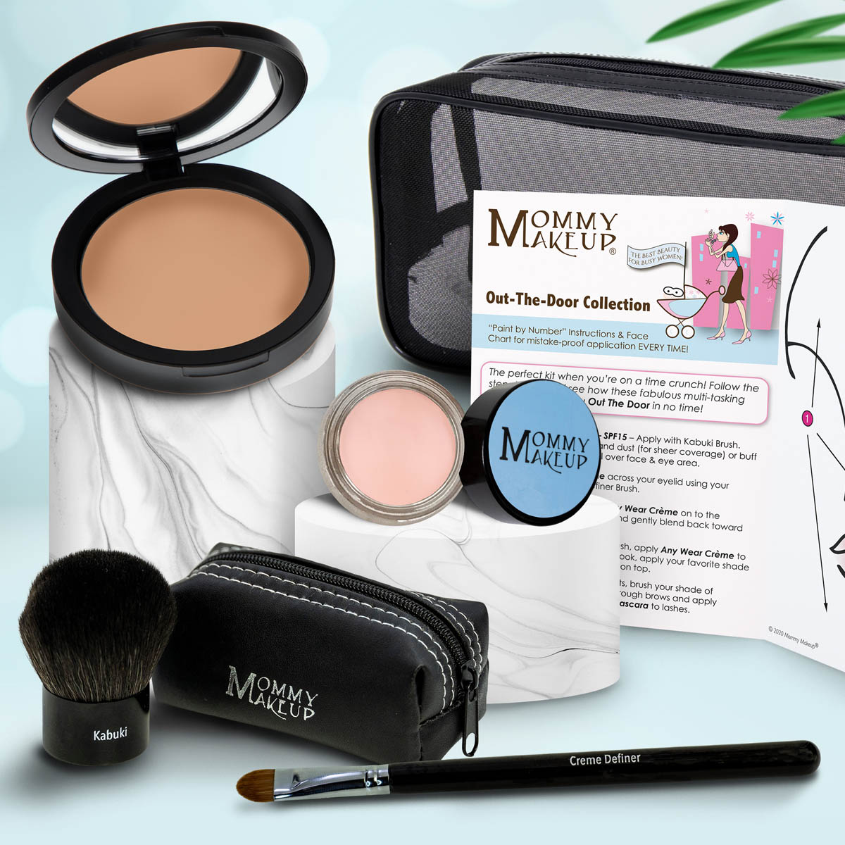 Makeup set with tan compact, pale pink powder jar, makeup brush, and zip pouch