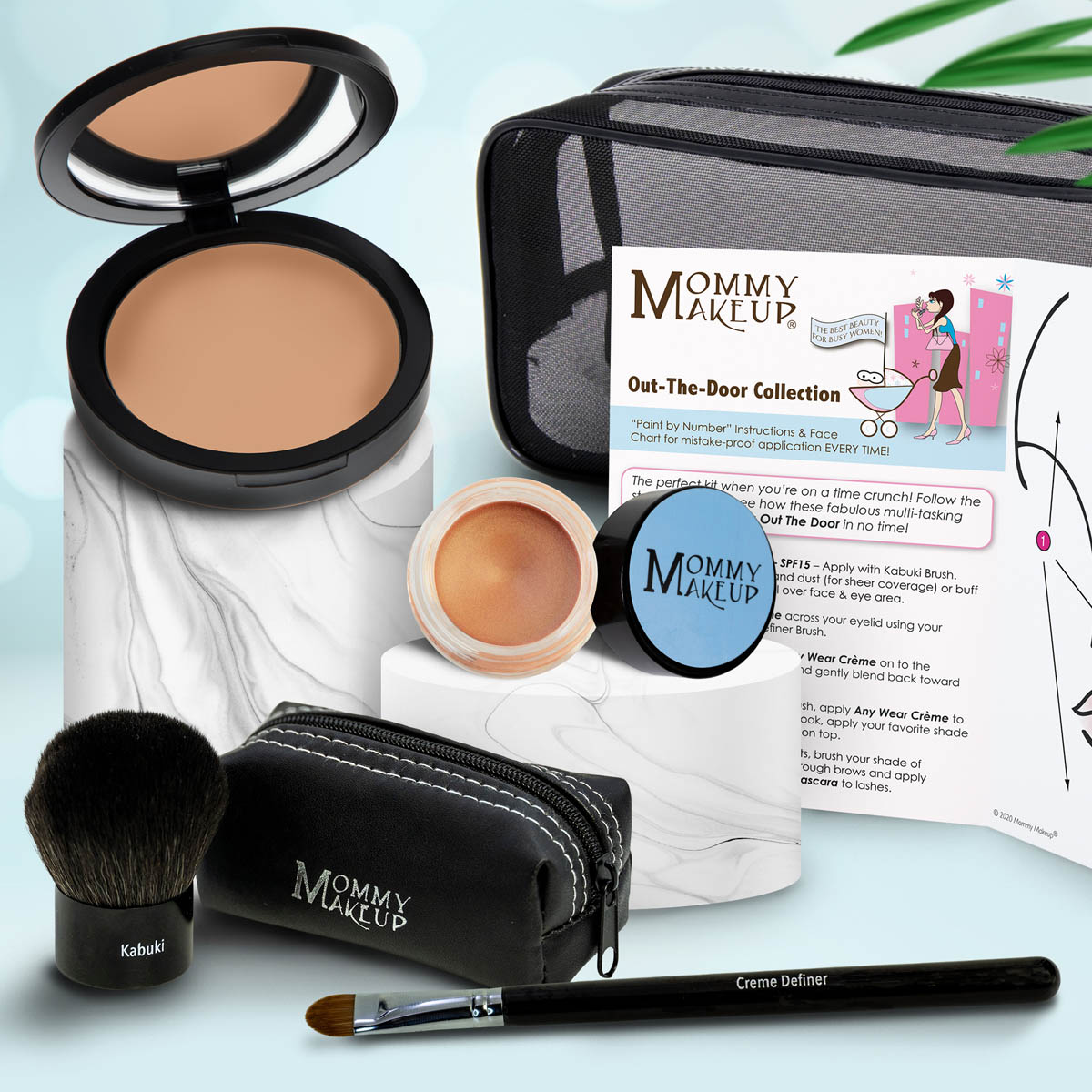 Makeup set with tan compact, peach powder jar, makeup brush, and zip pouch