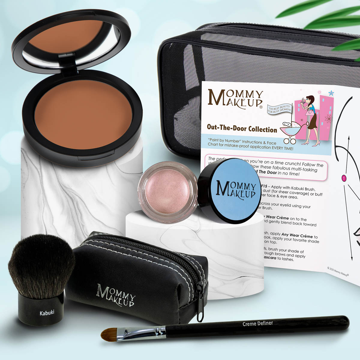 Makeup set with brown compact, light shimmery powder, kabuki brush, travel pouch