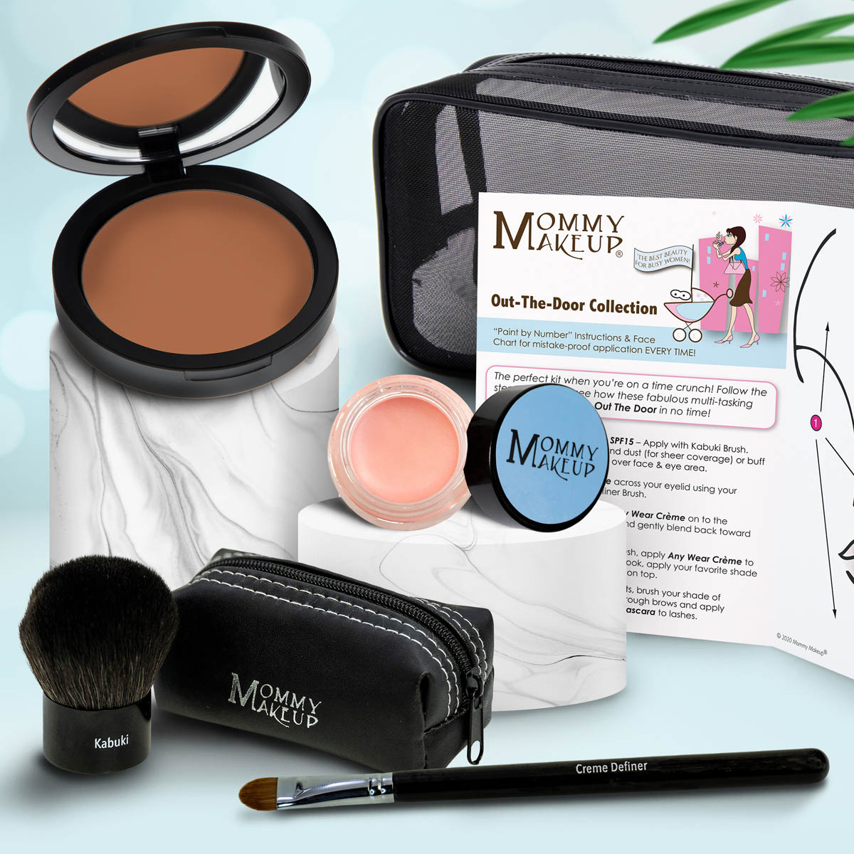 Makeup set with brown compact, light pink shimmery powder, kabuki brush, travel pouch