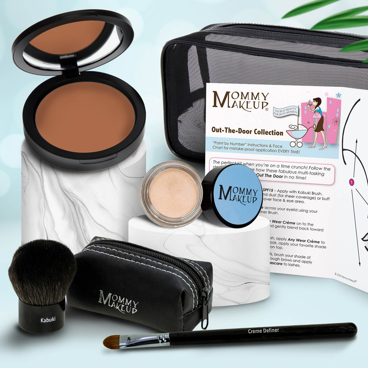 Makeup set with brown compact, pale beige shimmery powder, kabuki brush, travel pouch