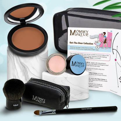 Travel makeup set with warm brown bronzer compact, pink cream, Kabuki brush, black zip case