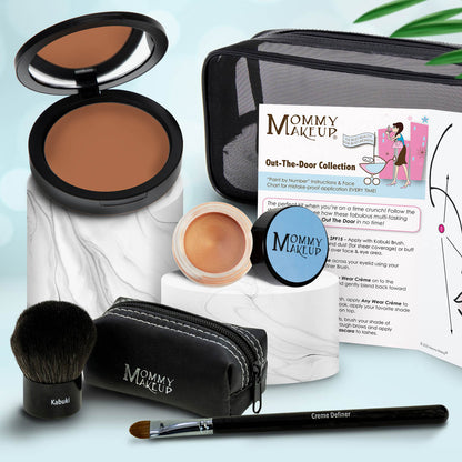Travel makeup set with warm brown bronzer compact, light peach cream, Kabuki brush, black zip case