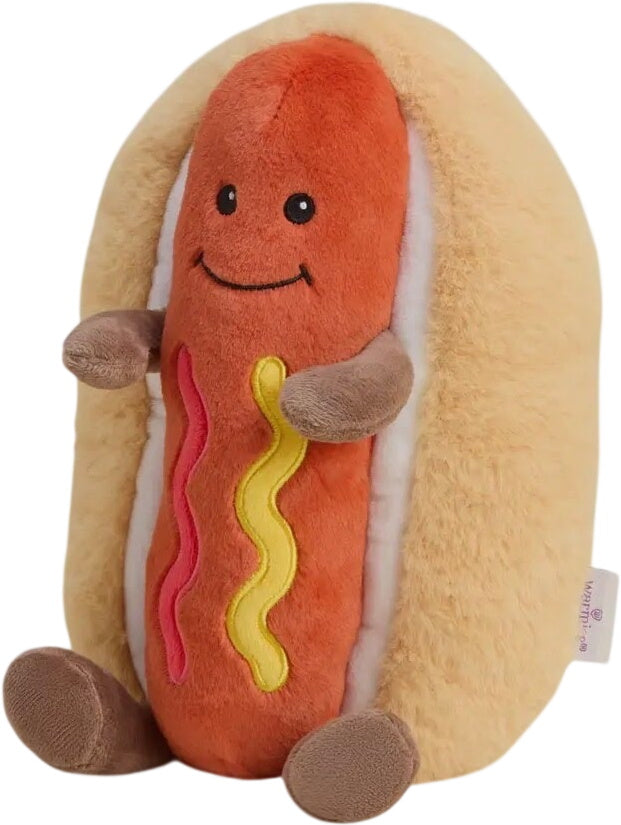 Warmies hotdog plush with smiling face, beige bun, red filling and yellow mustard stripe
