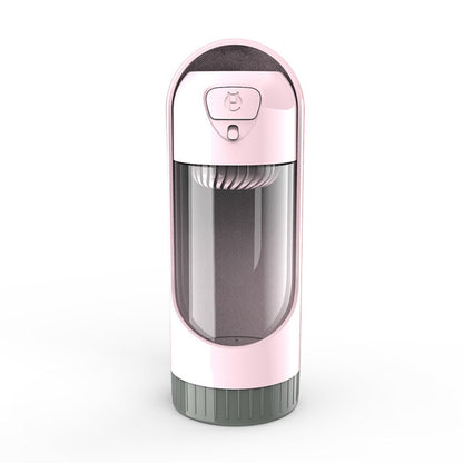 Portable dog water bottle in pink with flip-top lid and built-in drinking spout