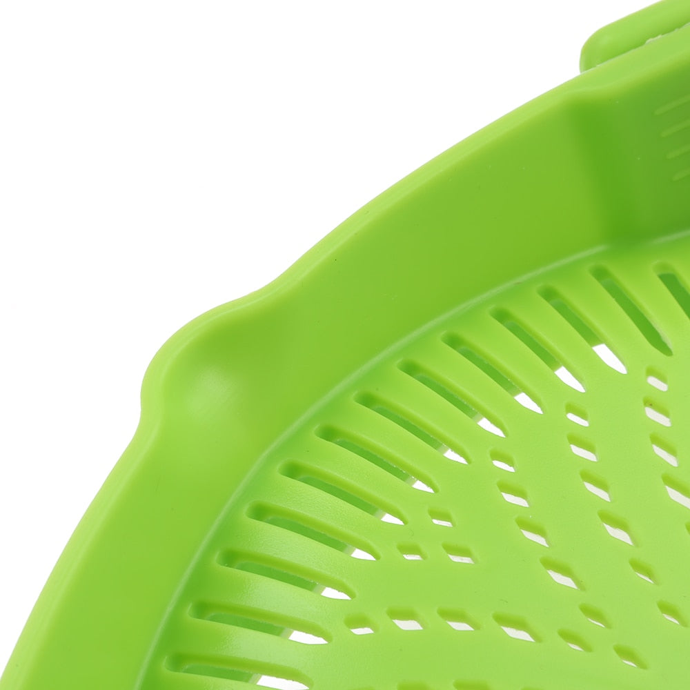 Green perforated silicone strainer insert with drainage slots