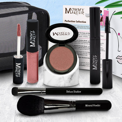 Makeup set with eyeshadow compact, dusty rose lip color tube, and two black brushes