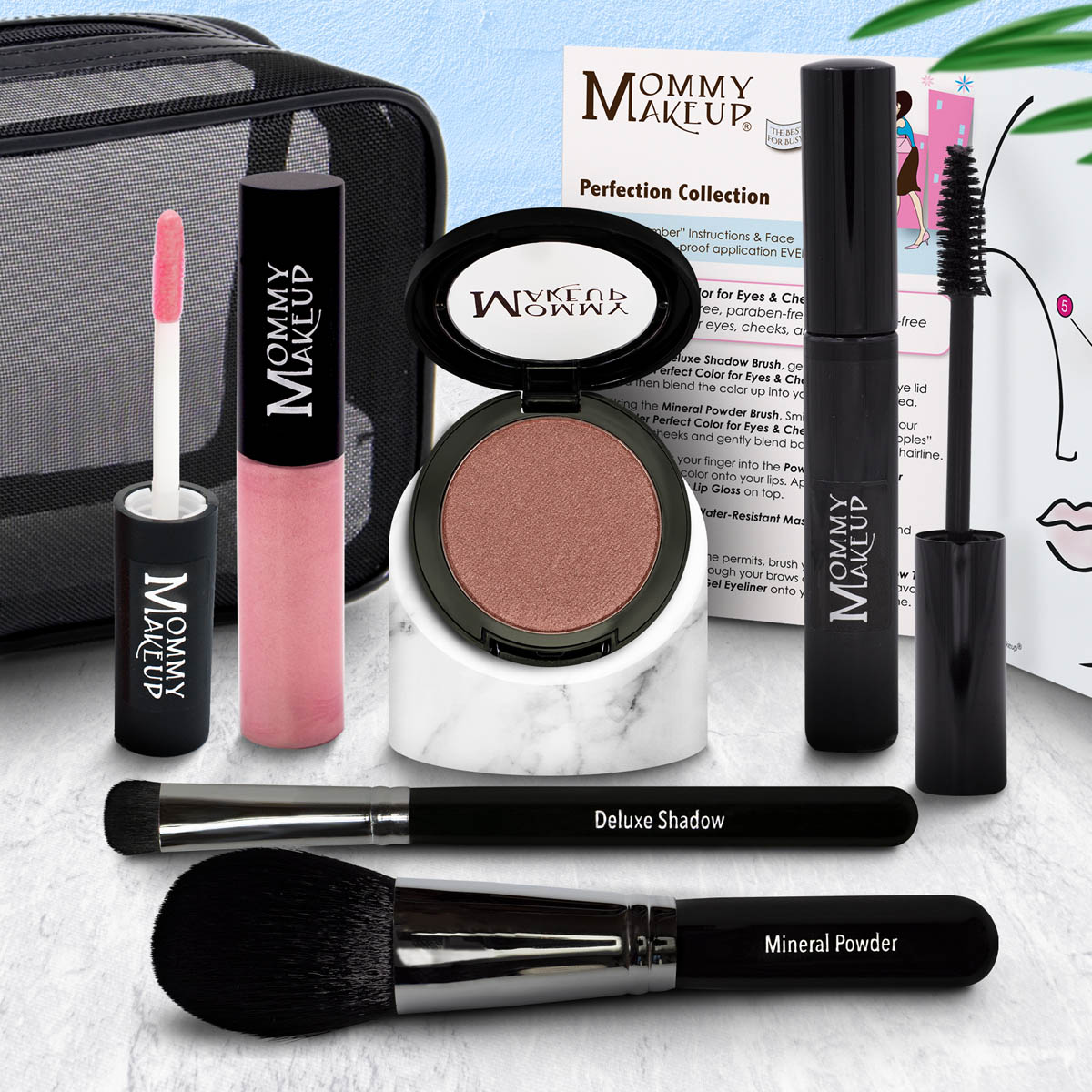 Mommy Makeup Perfection Collection set with bright pink liquid, mineral powder, and makeup brush