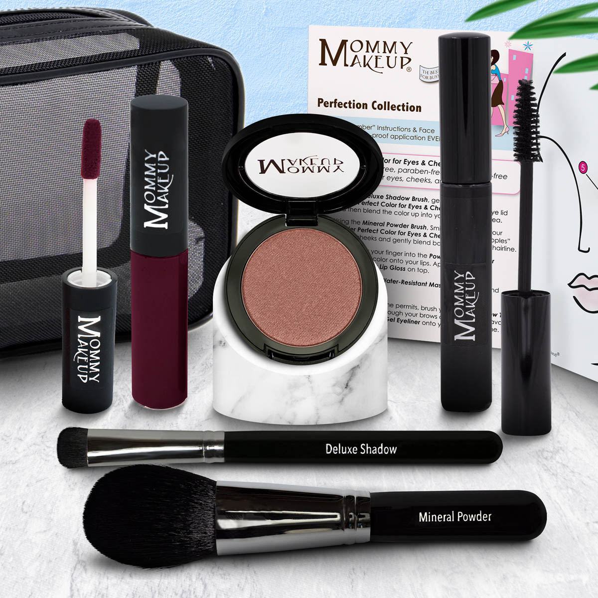 Mommy Makeup Perfection Collection set with deep berry liquid, mineral powder compact, and brush