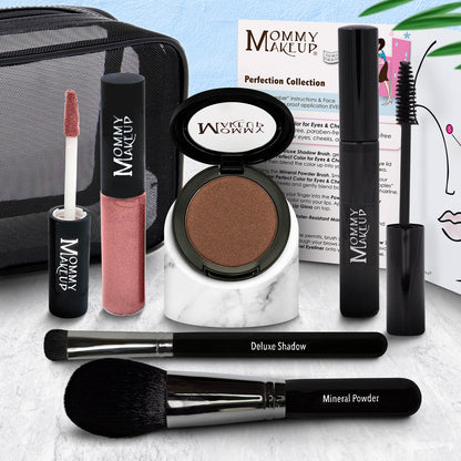 Makeup set with compact powder, dusty rose lip product, and two makeup brushes