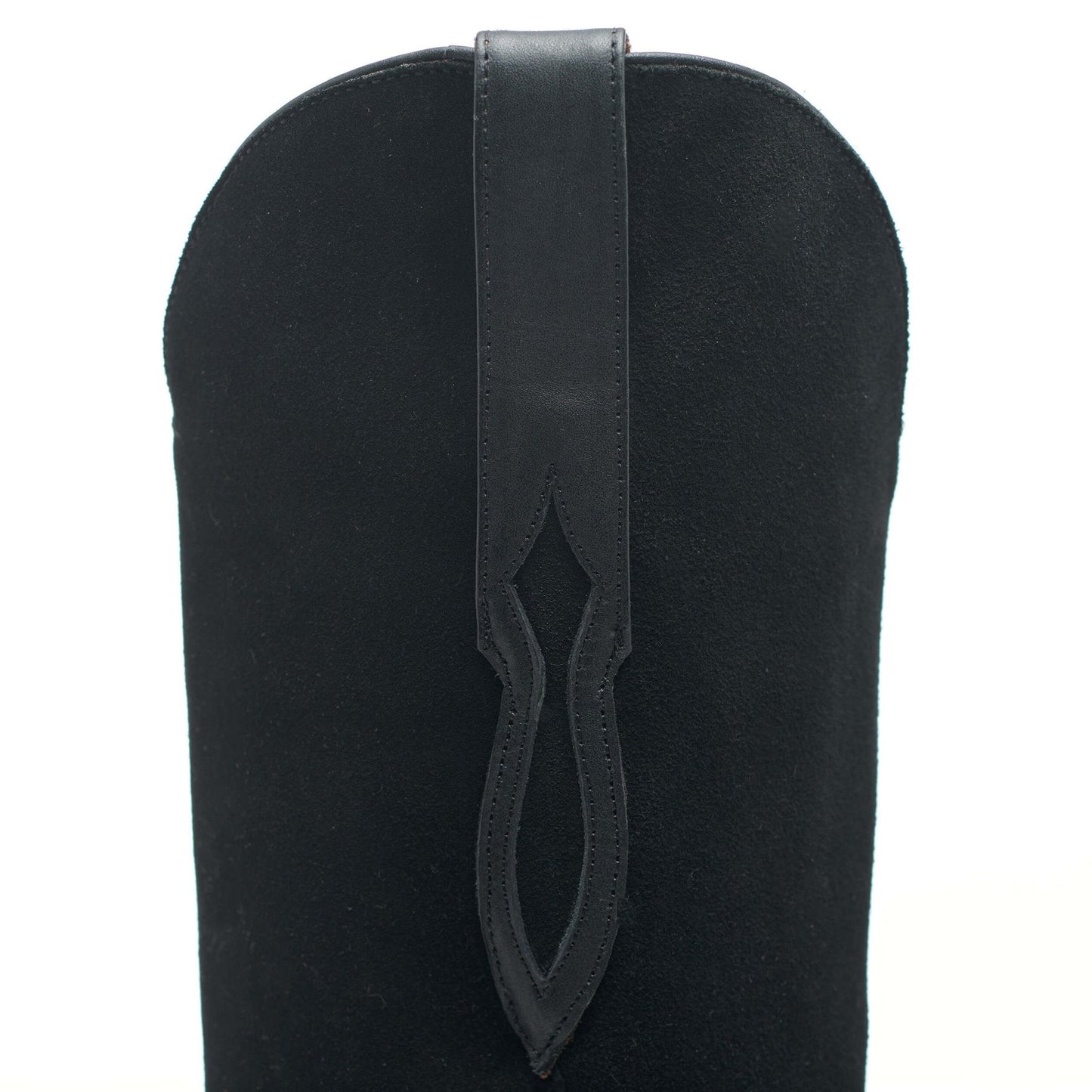 Black leather cowboy boot shaft close-up with V-shaped vent cutout